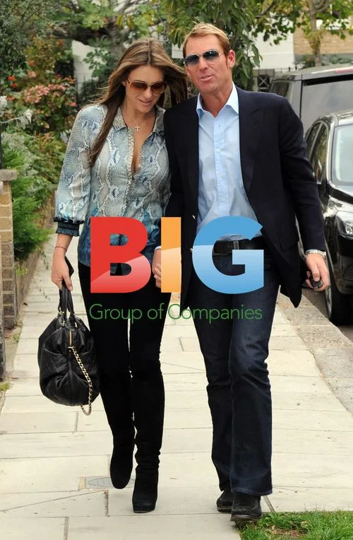Elizabeth Hurley and Shane Warne Leaving Restaurant