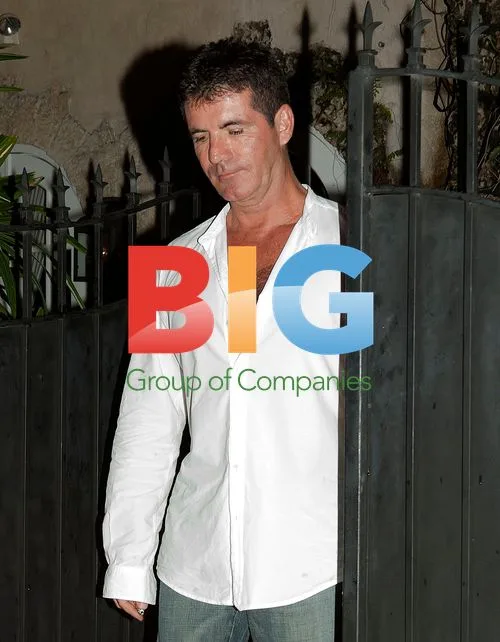 Simon Cowell with unknown woman in Miami