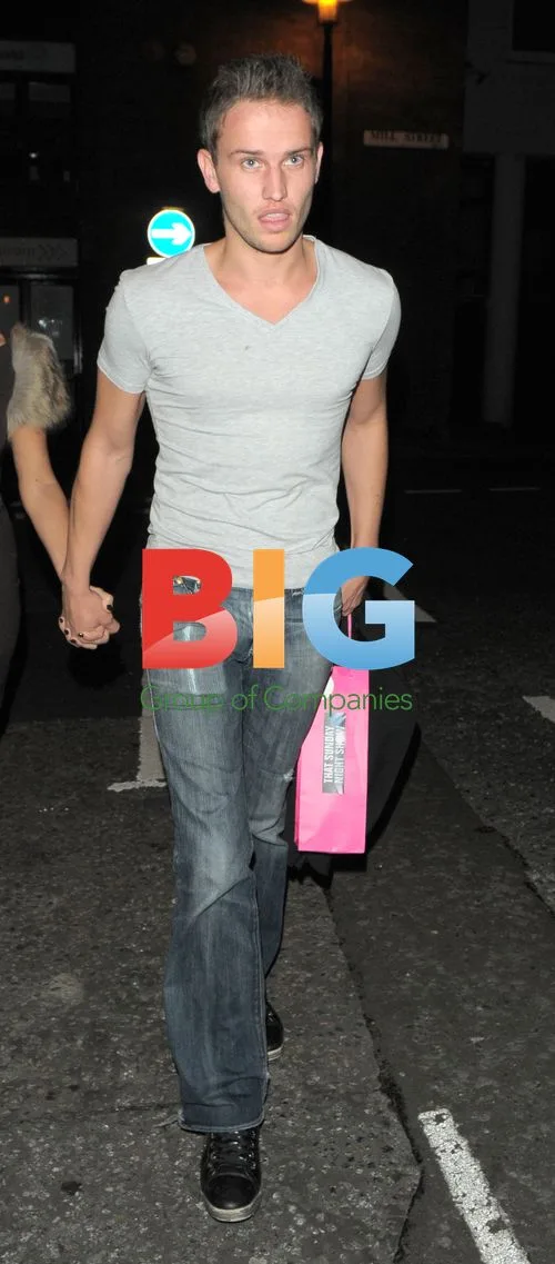 Imogen Thomas and Parris Taylor Leave Restaurant