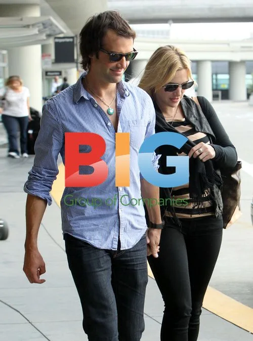 Kate Winslet and Ned Rocknroll at San Francisco Airport
