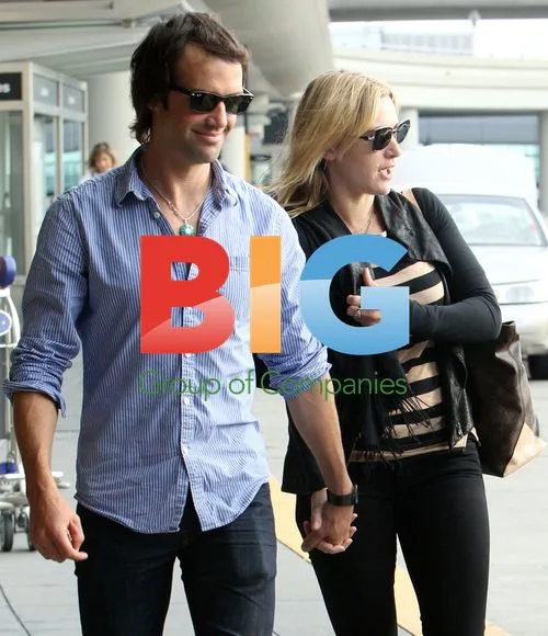 Kate Winslet and Ned Rocknroll Arrive in San Francisco