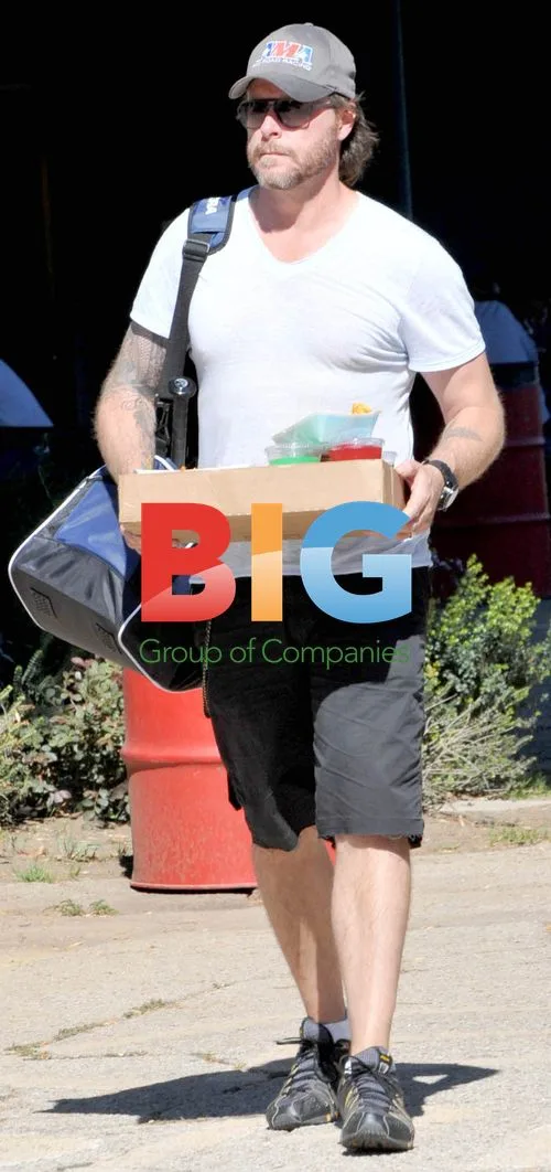 Dean McDermott with son Liam at softball
