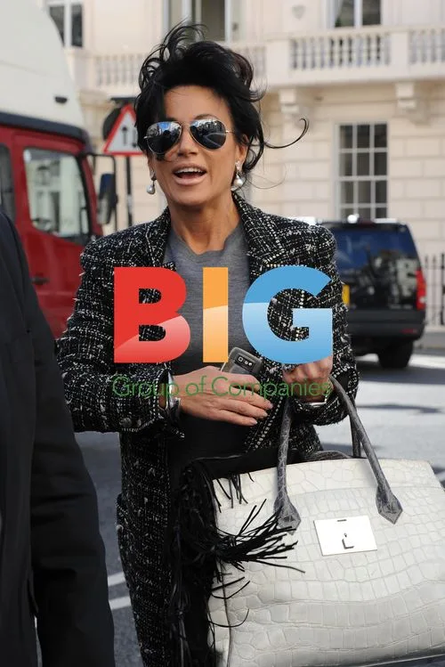 Nancy Dell'Olio Leaving Flat in London