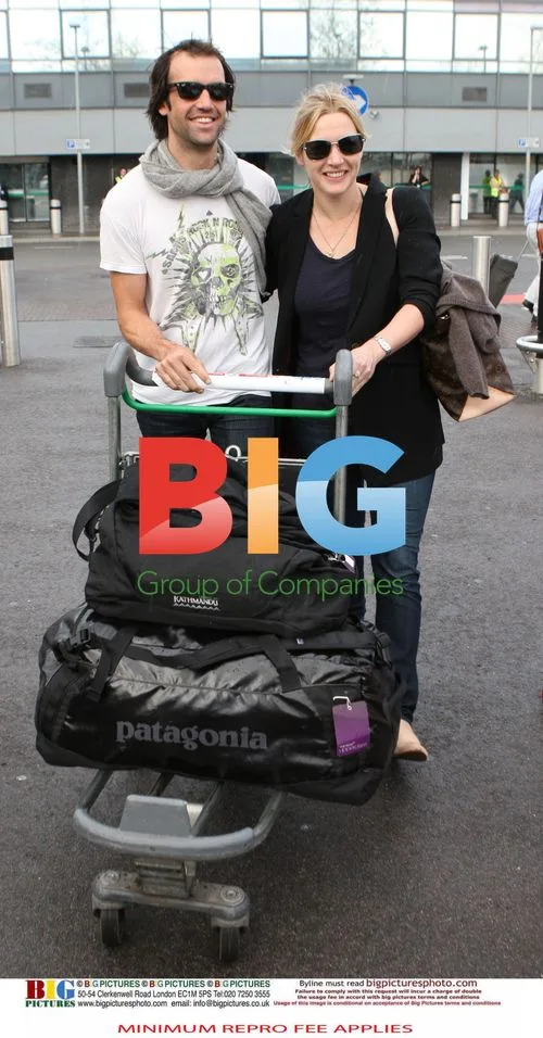 Kate Winslet with Boyfriend Ned Rocknrolla at Heathrow