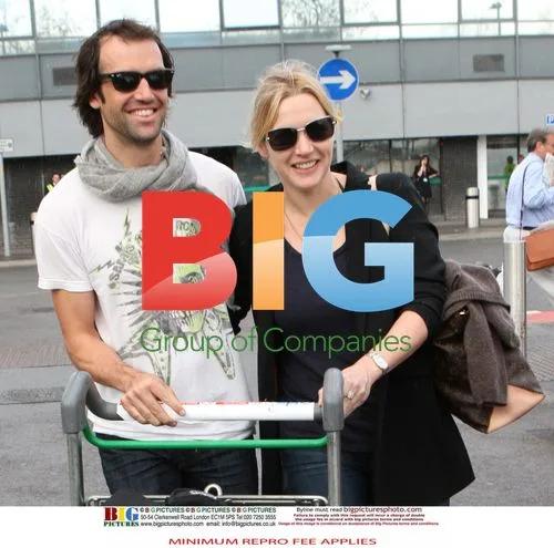 Kate Winslet and Ned Rocknrolla at Heathrow