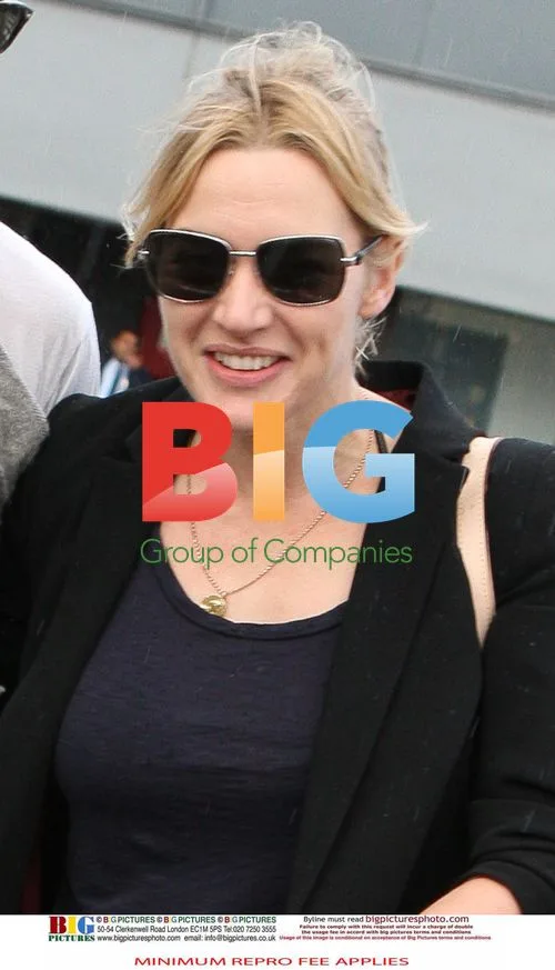 Kate Winslet and Ned Rocknrolla at Heathrow Airport