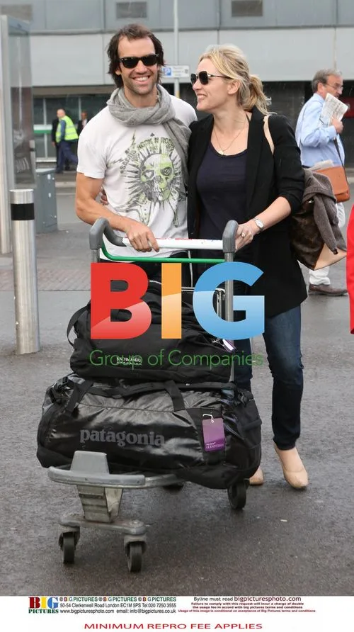 Kate Winslet and Boyfriend Ned Rocknrolla at Heathrow