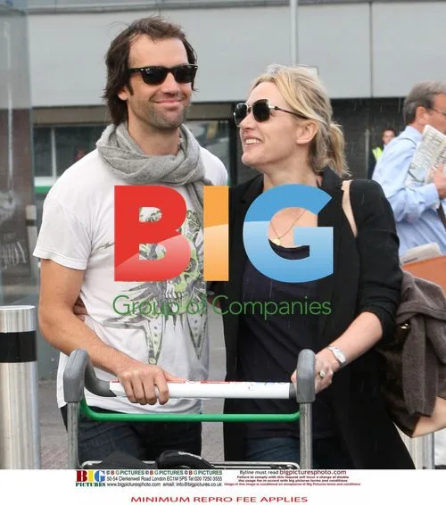 Kate Winslet and Ned Rocknrolla at Heathrow