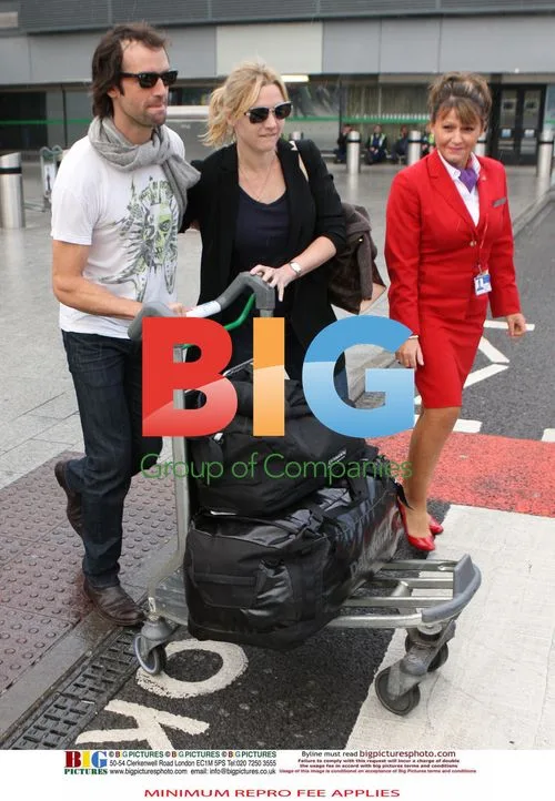 Kate Winslet and Ned Rocknrolla at Heathrow Airport