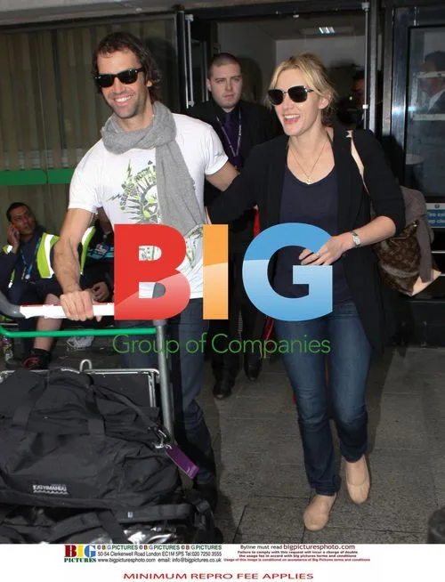 Kate Winslet and Ned Rocknrolla at Heathrow Airport