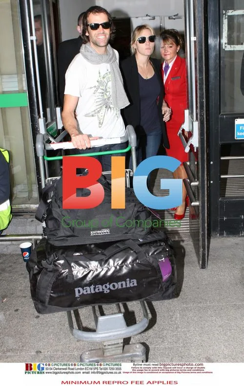 Kate Winslet and Ned Rocknrolla at Heathrow