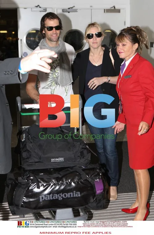 Kate Winslet and Ned Rocknrolla at Heathrow