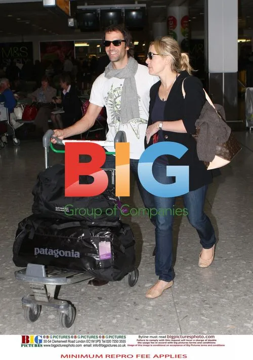 Kate Winslet and Ned Rocknrolla at Heathrow