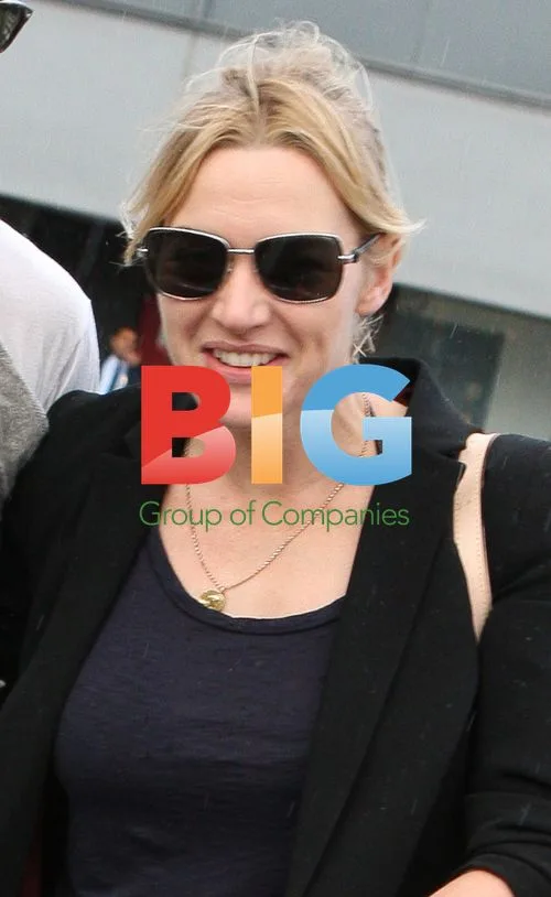 Kate Winslet and Ned Rocknrolla at Heathrow