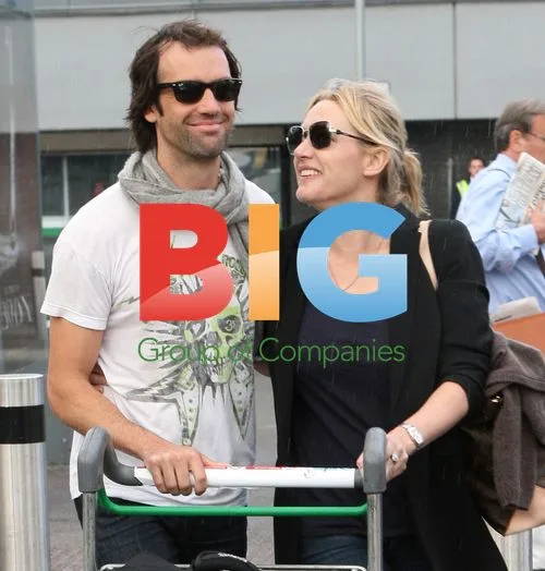 Kate Winslet and Ned Rocknrolla at Heathrow Airport