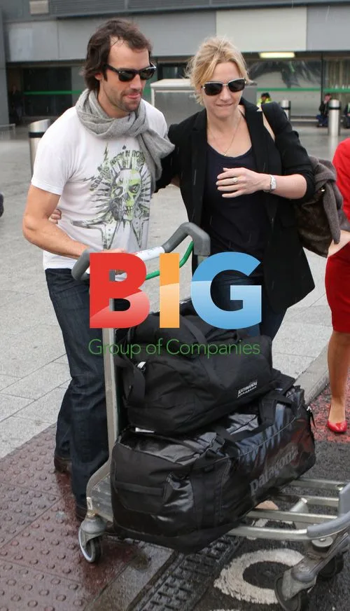 Kate Winslet and Ned Rocknrolla at Heathrow Airport