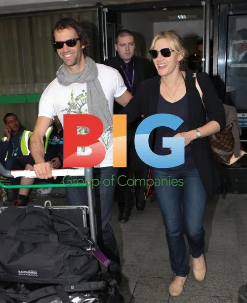 Kate Winslet and Ned Rocknrolla at Heathrow
