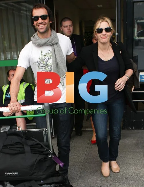 Kate Winslet and Ned Rocknrolla at Heathrow Airport