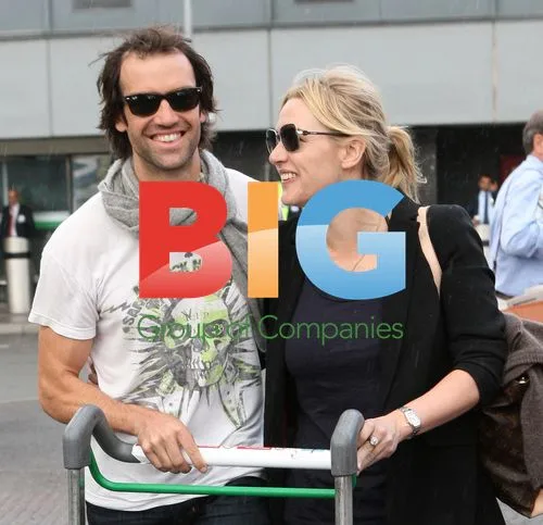Kate Winslet and Ned Rocknrolla at Heathrow