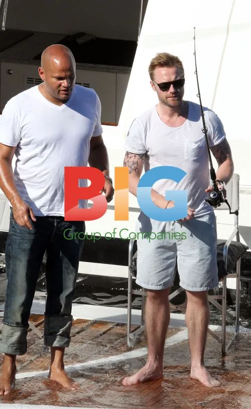 Ronan Keating, Mel B, and family on yacht in Sydney