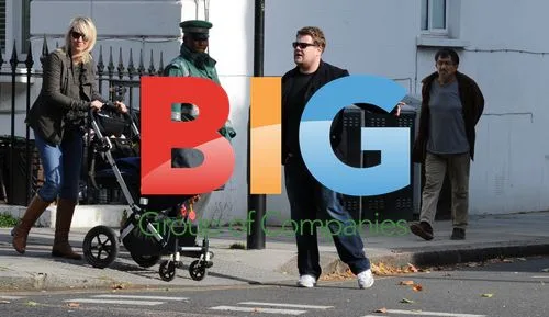 James Corden and Family Catch Cab in London