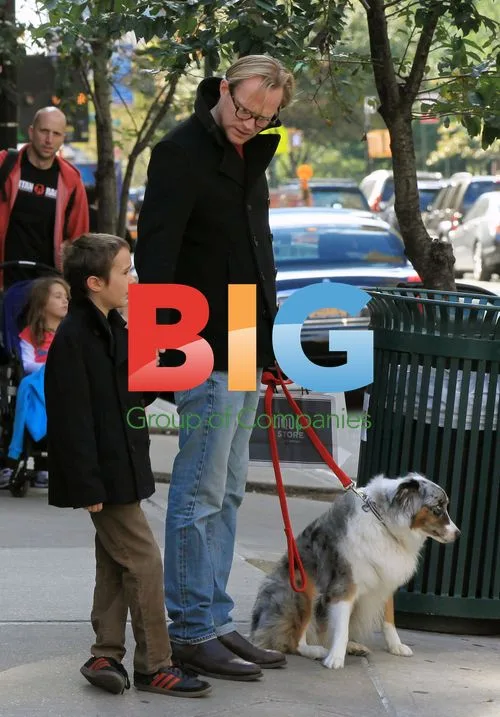 Paul Bettany and son Stellan with family dog