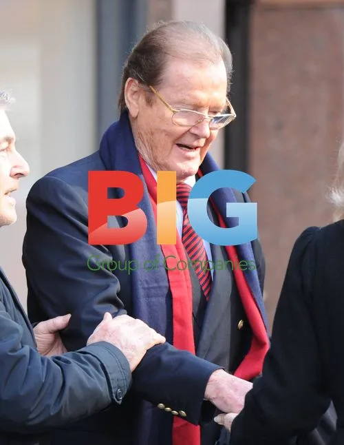 Sir Roger Moore and Lady Kristina Moore