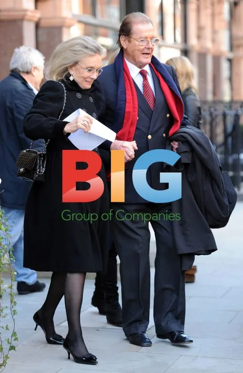 Sir Roger Moore and Lady Kristina Moore in London