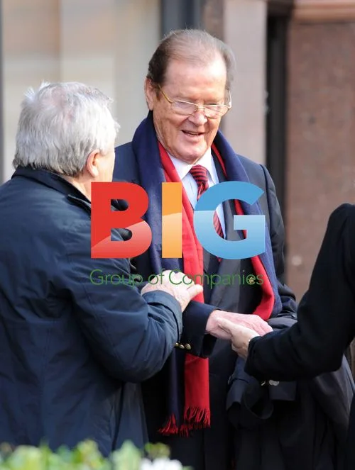Sir Roger and Lady Moore in London