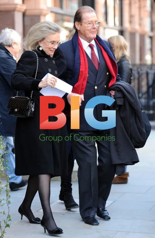 Sir Roger Moore and Lady Kristina Moore in London