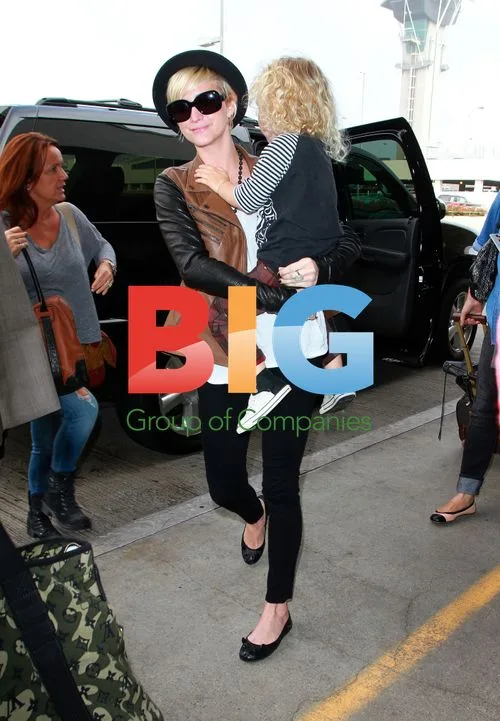 Ashley Simpson and family at LAX