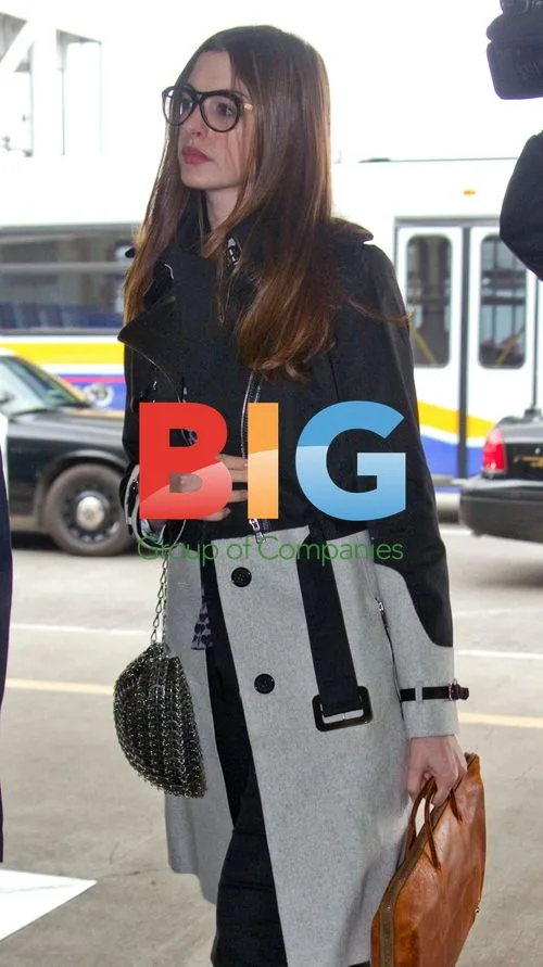 Anne Hathaway Arrives at LAX