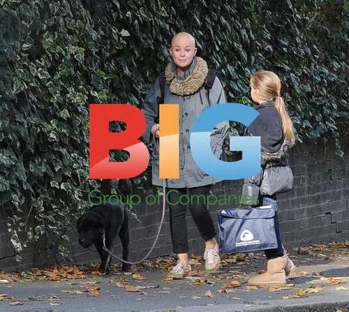 Gail Porter and daughter Honey walk dog in London