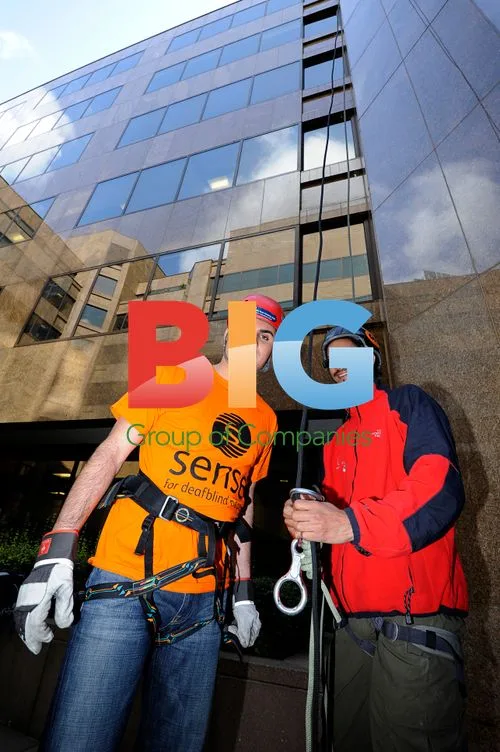 Apprentice stars abseil for charity
