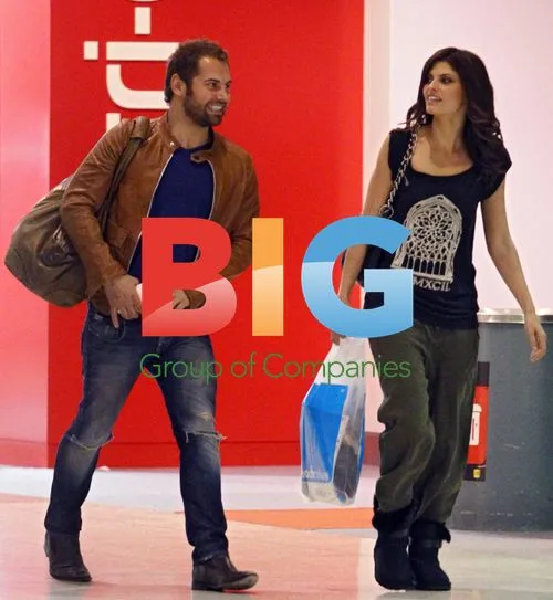 Daniel MacPherson and Zoe Ventoura at the airport