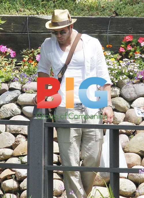 Kellan Lutz and Girlfriend at Lake Shrine Temple