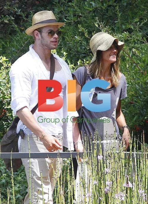 Kellan Lutz Visits Lake Shrine Temple with Girlfriend
