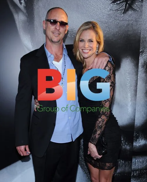 Brooke Burke and Gavin O'Connor attend 'Warrior' premiere
