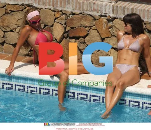 Katie Price enjoys Spanish pool day