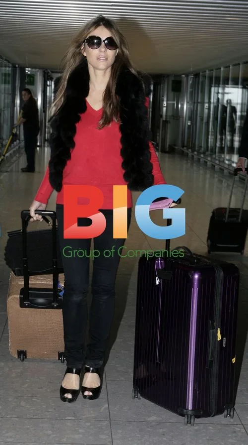 Liz Hurley Departs Heathrow Airport