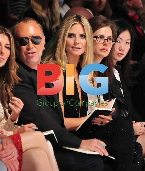 Heidi Klum, Michael Korrs, and Nina Garcia at NYFW