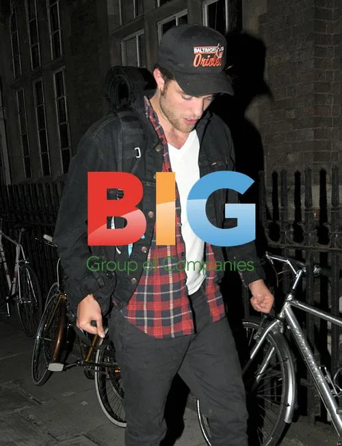 Robert Pattinson Strolls in London