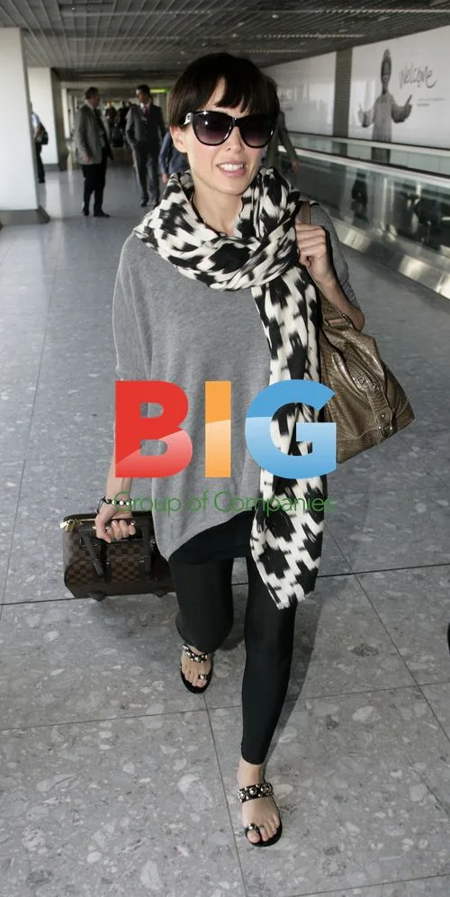 Danni Minogue Arrives at Heathrow