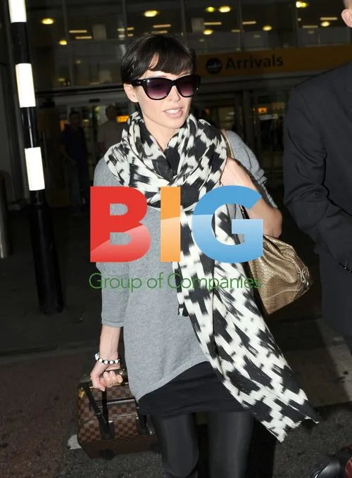 Danni Minogue Arrives at Heathrow