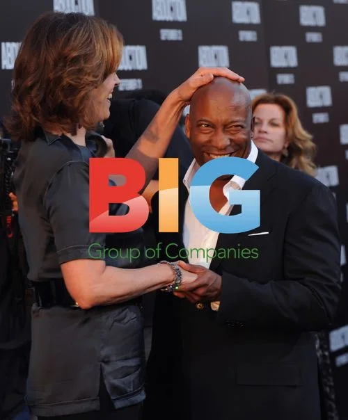 John Singleton and Sigourney Weaver at "Abduction" Premiere