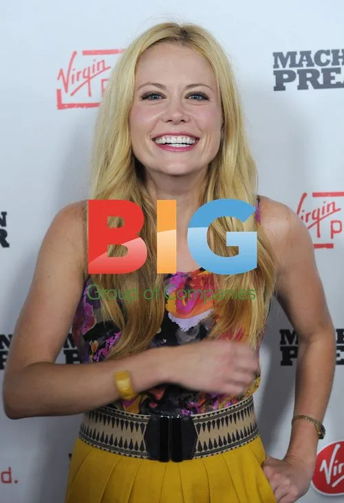 Claire Coffee Arrives for "Machine Gun Preacher" Premiere