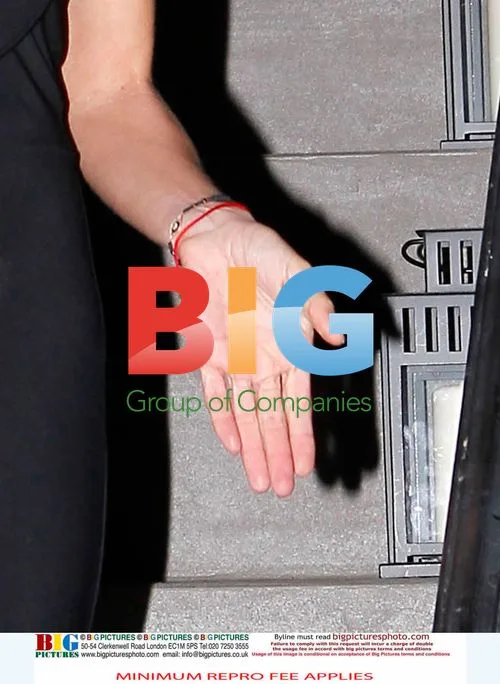 Simon Cowell Leaves Friend's House with Fiancee