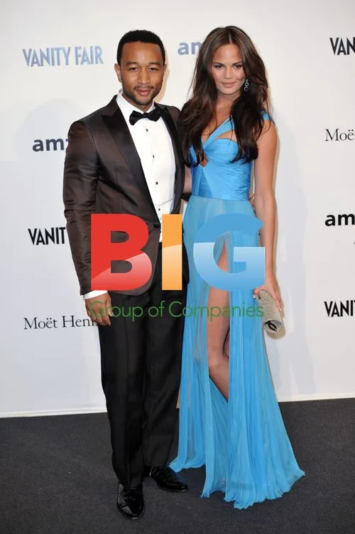 John Legend and Christine Teigen at amfAR MILANO 2011