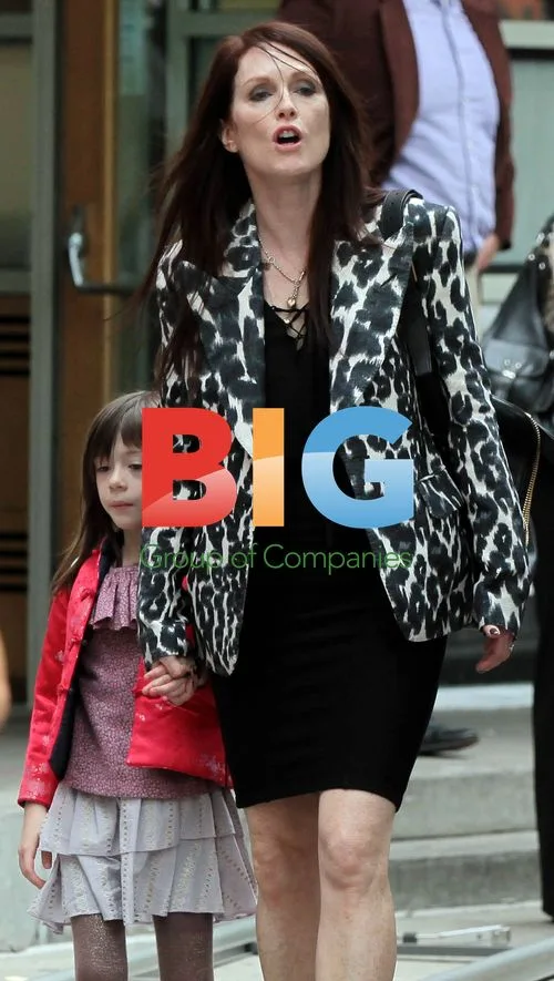 Julianne Moore and Onata Aprile on "What Maisie Knew" set