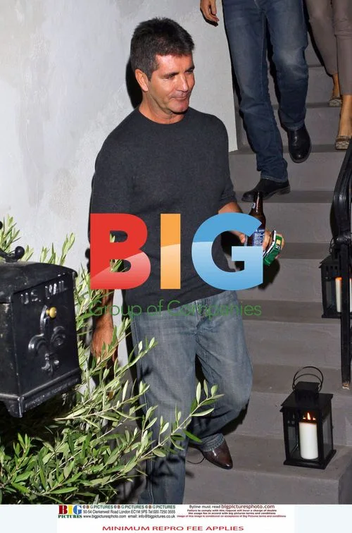 Simon Cowell Leaves Friend's House